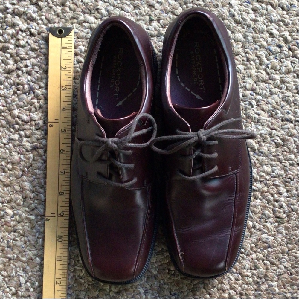 Brown leather Rockport men's shoes.